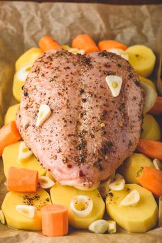 Seasoned chicken breast ready for roast in oven