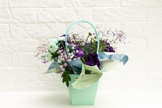 bouquet of purple and white flowers on white background