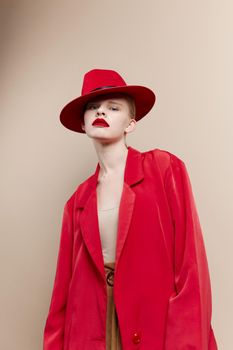 fashionable woman red lips fashion jacket cosmetics isolated background. High quality photo