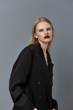 glamorous woman fashion makeup in black jacket isolated background. High quality photo