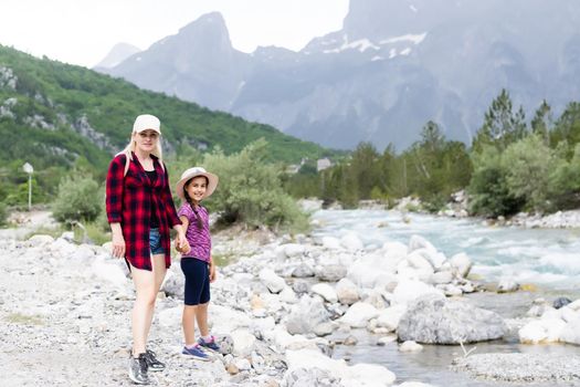 Traveling mother and daughter in the mountains of albania.