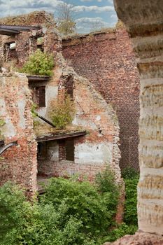 A destroyed brick building on the territory of the Oreshek fortress, red brick ruins