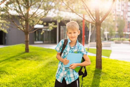 A little boy go to school in semester start day