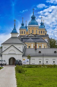 View of a modern Christian church with a blue roof. Church against the sky