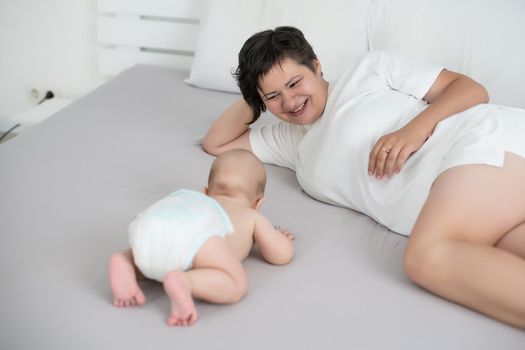picture of happy mother with baby in hands.