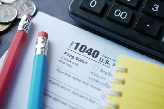 Close up of a Tax return form and pen on table