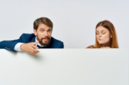 business man and woman billboard marketing fun emotions isolated background. High quality photo