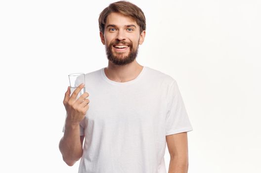 handsome man glass of water isolated background. High quality photo