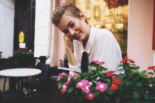 short haired woman on the street vacation in the city summer Lifestyle. High quality photo