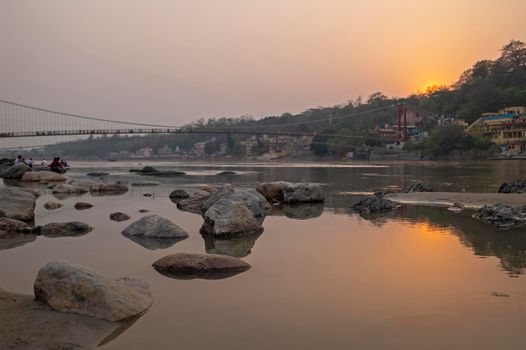 The holy river Ganga in India at sunset