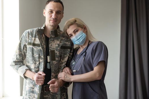 Soldiers and nurses who are lovers. Medical personnel and happy military personnel.