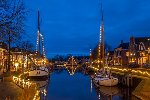 The historical village Dokkum in christmas time in the Netherlands at night