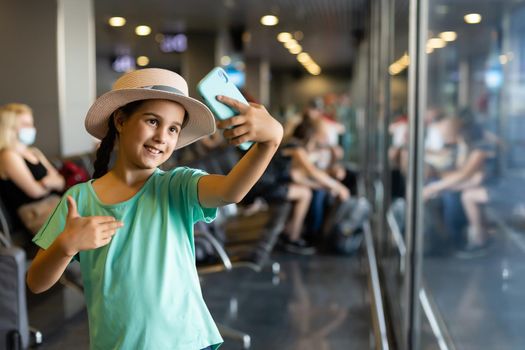 little girl with suitcase travel in the airport, kids travel.