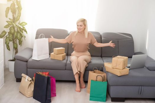 Woman and shopping bags at home, black Friday