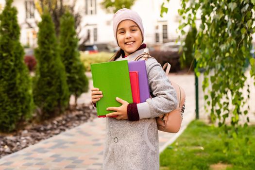 little girl with a backpack going to school.