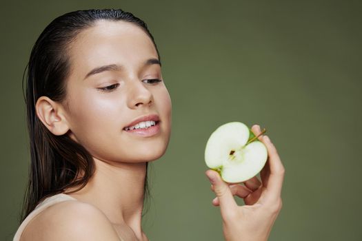 portrait woman apple in hands posing fruit healthy food fresh close-up Lifestyle. High quality photo