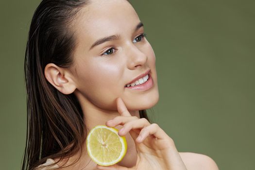 portrait woman lemon vitamins health cosmetology close-up Lifestyle. High quality photo
