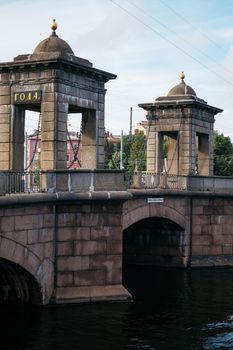 Saint-Petersburg, Russia, 06 September 2020: Close-up view of the stone Staro-Kalinkin Bridge across the Fontanka River in the Admiralteisky District. Built in 1780s.