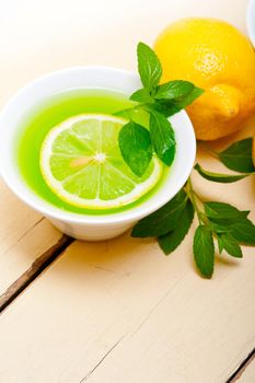 fresh and healthy mint infusion tea tisane with lemon