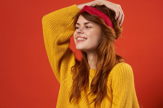pretty woman with red headband yellow sweater fashion hipster. High quality photo