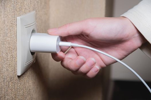 Turning off appliances that are not working saves energy. Unused phone chargers or power adapters. Plug the charging adapter into a European socket. Charging block yusb with interface type c.