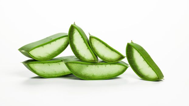 Close up group of fresh green Aloe Vera slices full of juicy gel isolated on white background, low angle view
