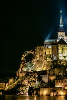 Night view of Mont-Saint Michel Lighted up. Shooting Location: France, Normandy Region