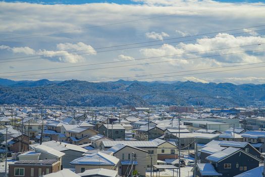 Image of the city of Fukushima covered with snow. Shooting Location: Fukushima Prefecture