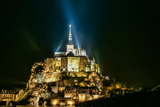 Night view of Mont-Saint Michel Lighted up. Shooting Location: France, Normandy Region