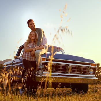 Shot of an affectionate young couple enjoying a roadtrip together