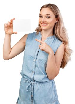 Happy beautiful casual woman holding a blank card isolated on white background