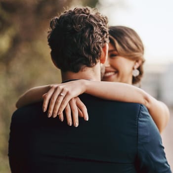 Shot of a happy young couple standing together on their wedding day