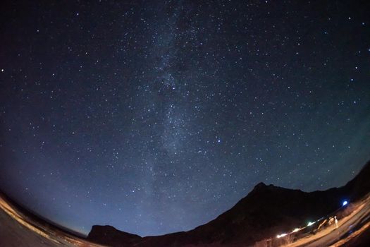 Mountain silhouette and starry sky (Iceland). Shooting Location: Iceland, Lay Cavik