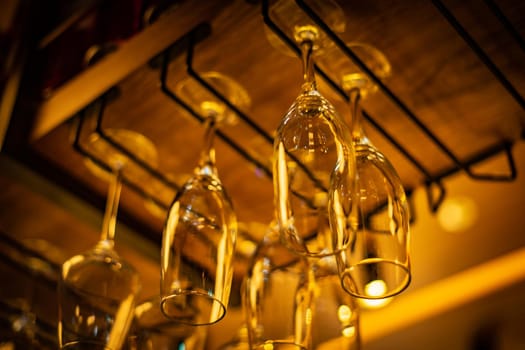 Wine glasses hanging on the ceiling. Shooting Location: Tokyo metropolitan area