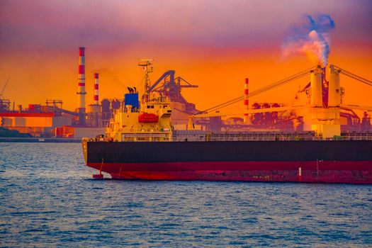 Sunset view with cargo ship silhouette. Shooting Location: Yokohama-city kanagawa prefecture