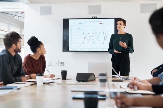 Shot of a group of businesspeople having a meeting in a modern office