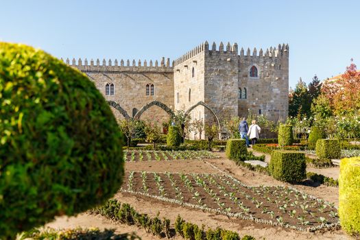 Braga, Portugal - October 27, 2021: Garden of Santa Barbara (Jardim de Santa Barbara) where gardeners work in the historic city center on an autumn day