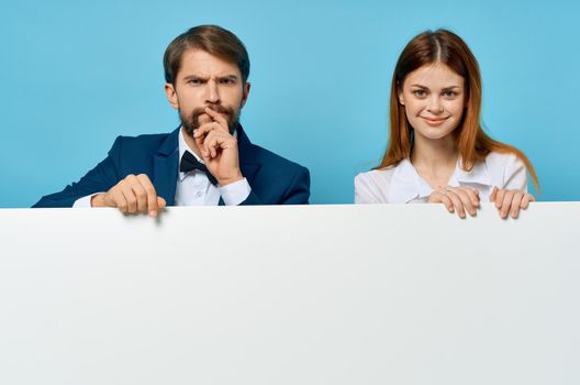 business man and woman advertising presentation white banner isolated background. High quality photo