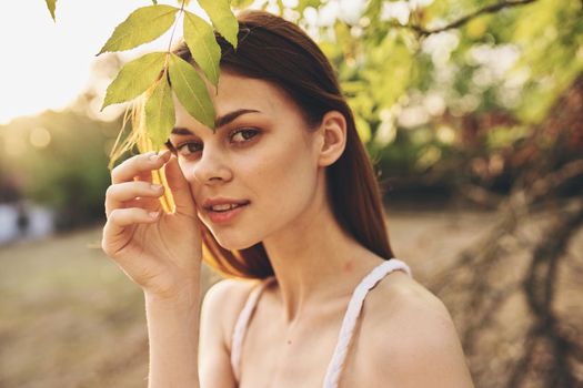 pretty woman glamor nature posing summer close-up. High quality photo