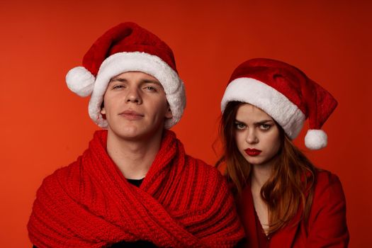 young couple in New Year's clothes Christmas holiday studio Lifestyle. High quality photo