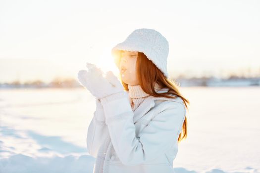 young woman winter clothes walk snow cold vacation nature. High quality photo