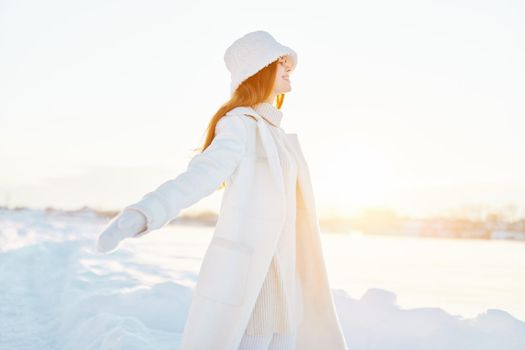 young woman winter clothes walk snow cold vacation Fresh air. High quality photo