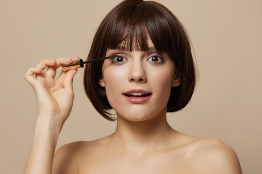 brunette Mascara cosmetics attractive look posing close-up Lifestyle. High quality photo