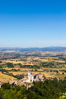 Assisi village in Umbria region, Italy. The town is famous for the most important Italian St. Francis Basilica (Basilica di San Francesco)