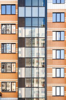 glazed balconies and loggias of modern apartment buildings.
