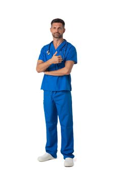 Male nurse or doctor in blue uniform with thumb up studio full length portrait isolated on white background