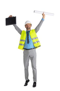 Successful construction architect in formal suit and hardhat with rolled blueprints with arms raised isolated on white background