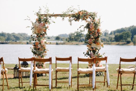 A place for a wedding ceremony on the street. Decorated wedding venue.