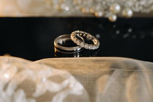 A pair of gold wedding rings.Two wedding rings.