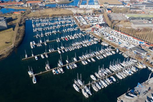 Copenhagen, Denmark - March 08, 2021: Aerial drone view of Lynetten sailboat Harbor